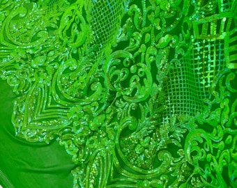 May include: Bright green fabric with intricate sequin embellishments. The fabric features a detailed pattern of swirling designs and geometric shapes. The sequins catch the light, creating a shimmering effect. The fabric is suitable for apparel and decorative projects.