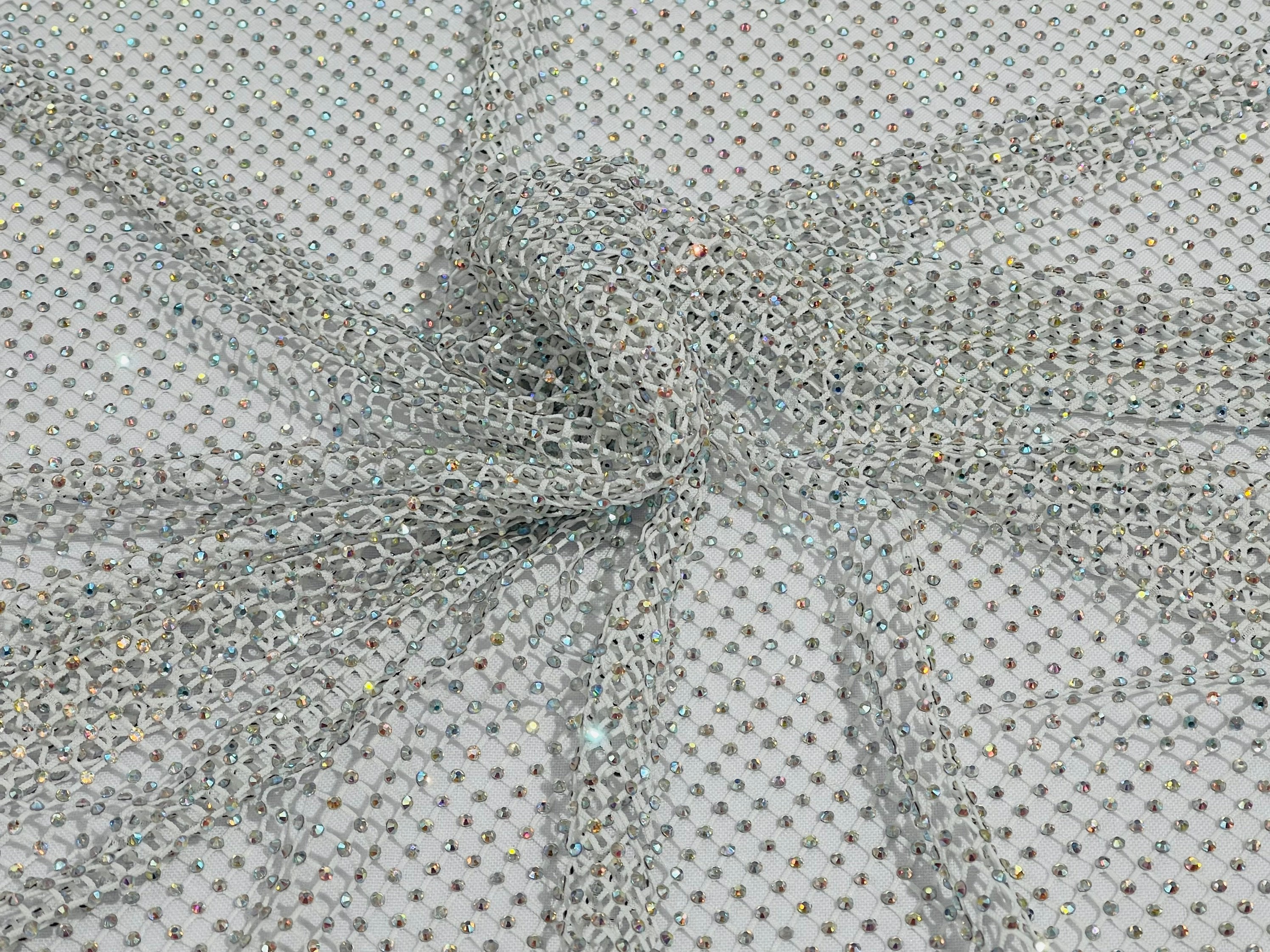 Iridescent Rhinestones Fabric On White Stretch Net Fabric, Spandex Fish Net  with Crystal Stones sold by the yard