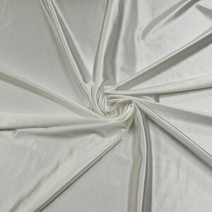 Off-White Shiny Polyester Spandex Fabric: 4-Way Stretch, Costume & Swimwear