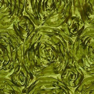 May include: Green satin fabric with a rosette pattern. The fabric is made of soft, flowing material and has a luxurious feel.