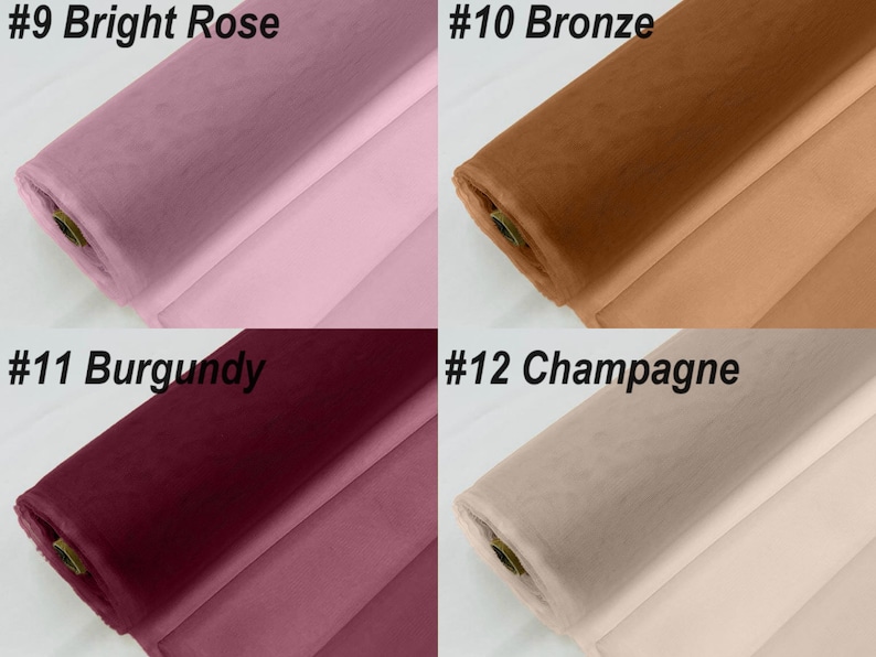 May include: Four rolls of tulle fabric in different colours: bright rose, bronze, burgundy, and champagne.