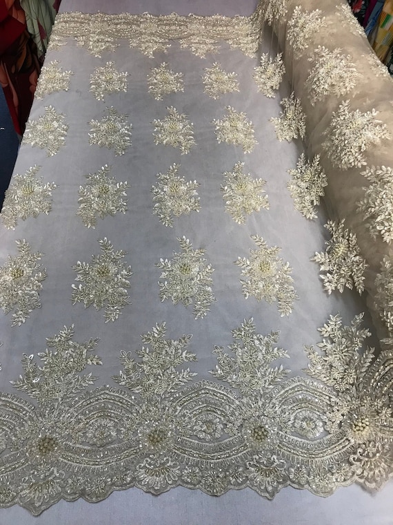 Sheath - Ivory cream with black loops and dots motif.