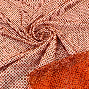 Burnt Orange Rhinestones Fabric On Orange Stretch Net Fabric, Spandex Fish Net with Crystal Stones sold by the yard