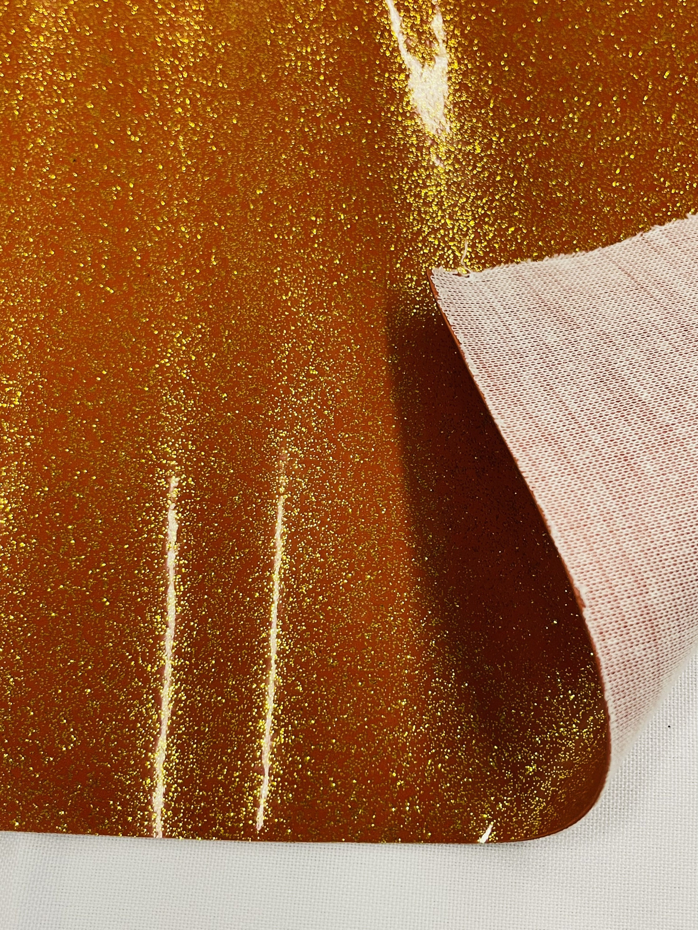 Orange Sparkle Metallic Glitter Vinyl Upholstery & Crafting Fabric –  Fashion Fabrics LLC