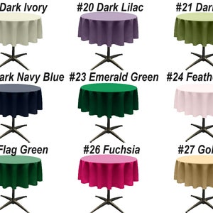 May include: Nine round tablecloths in various colors, including dark ivory, dark lilac, dark lime, dark navy blue, emerald green, feather pink, flag green, fuchsia, and gold. Each tablecloth is shown on a round table with a black base.