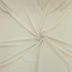 Ivory ITY Knit Fabric: 2-Way Stretch Spandex Polyester, Sold By The Yard