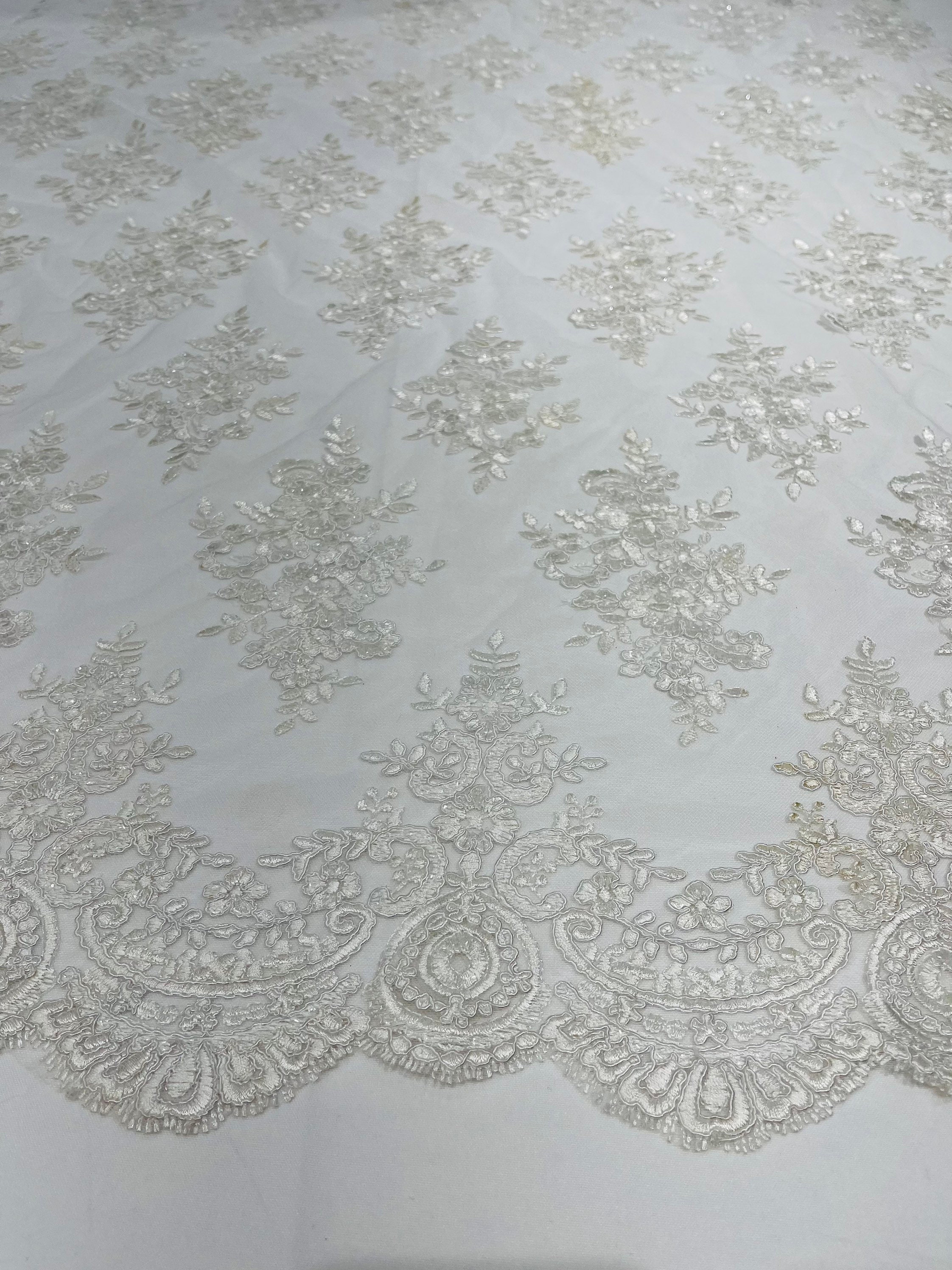 White Floral Lace Fabric - by yard - Embroidery With Sequins on a