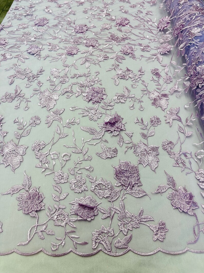 DARK LILAC FLORAL DESIGN WITH CORD EMBROIDERY ON A MESH LACE-SOLD BY YARD. main image 0