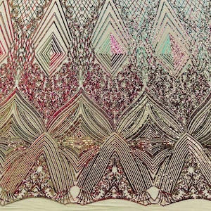 May include: Sequin fabric with a geometric pattern in shades of gold, pink, and green. The fabric has a mesh backing.
