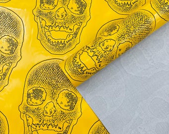 Yellow Skull Embossed Faux Leather Upholstery Fabric: 54" Wide