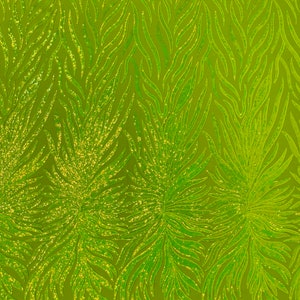 May include: Lime green fabric with a sparkly, flame-like pattern. The fabric is textured and has a subtle sheen.