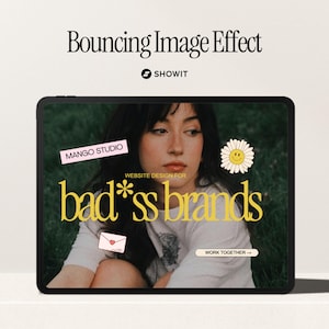 May include: A tablet screen displaying a website design for "bad*ss brands" with a woman in the background. The website design features a yellow and white daisy with a smiley face, a pink and white sticker that says "MANGO STUDIO", a white envelope with a red heart, and a white button that says "WORK TOGETHER".