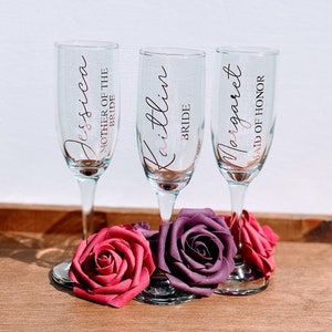 Custom Champagne flutes / champagne glasses for every occasion! Bridal Showers. Bachelorette Parties. Weddings. Family parties. Bridesmaid