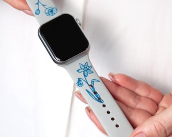 Gray Apple Watch band with blue color engraved customized birth month flowers