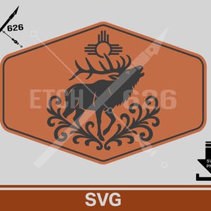 May include: An orange and black graphic design featuring a silhouette of an elk with antlers, a sun symbol, and decorative flourishes. The text "SVG" is at the bottom. The design is in a rectangular shape.