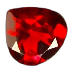 May include: A vibrant, deep red gemstone with a faceted, heart-shaped cut. The stone displays a brilliant, translucent quality with sharp, geometric edges and reflective surfaces that catch the light, creating a rich, saturated crimson appearance.