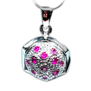 May include: A silver-toned pendant featuring a rounded, textured surface embedded with multiple small, vibrant pink circular stones. The pendant is attached to a silver-toned bail and hangs from a thin silver-toned chain, creating a cohesive piece.