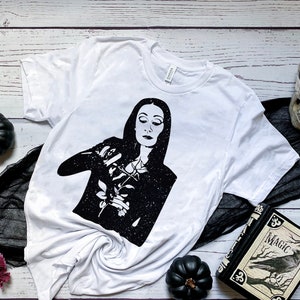 Morticia Addams Family, Think Like Lily, Work It Like Elvira, Love Like The Bride, Dance Like Morticia, Horror Goth Queens Shirt
