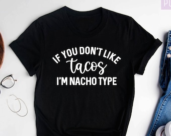 Könnte beinhalten: Schwarzes T-Shirt mit weißem Text, der "Wenn du Tacos nicht magst, bin ich nicht dein Typ" lautet.