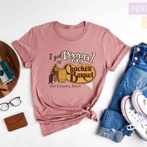 a women's t - shirt with the slogan i am proud to be a