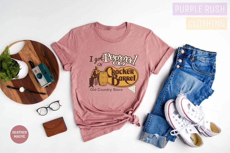 a women's t - shirt with the slogan i am proud to be a