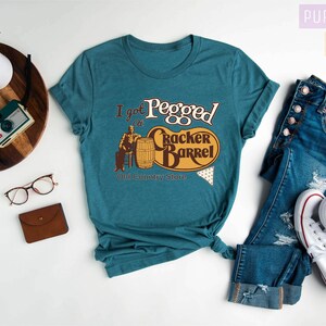 a women's t - shirt that says i'm proud to be a