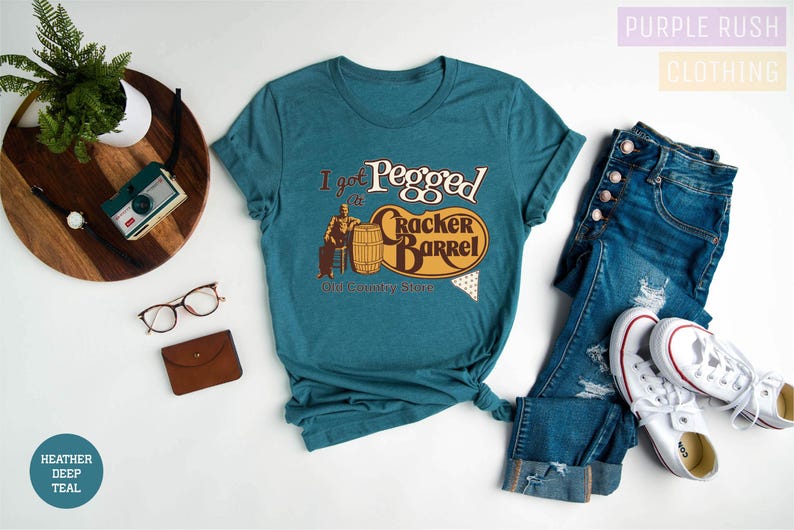 a women's t - shirt that says i'm proud to be a