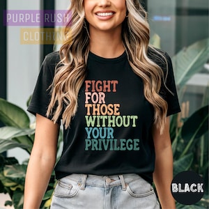 a woman wearing a black t - shirt with the words fight for those without your