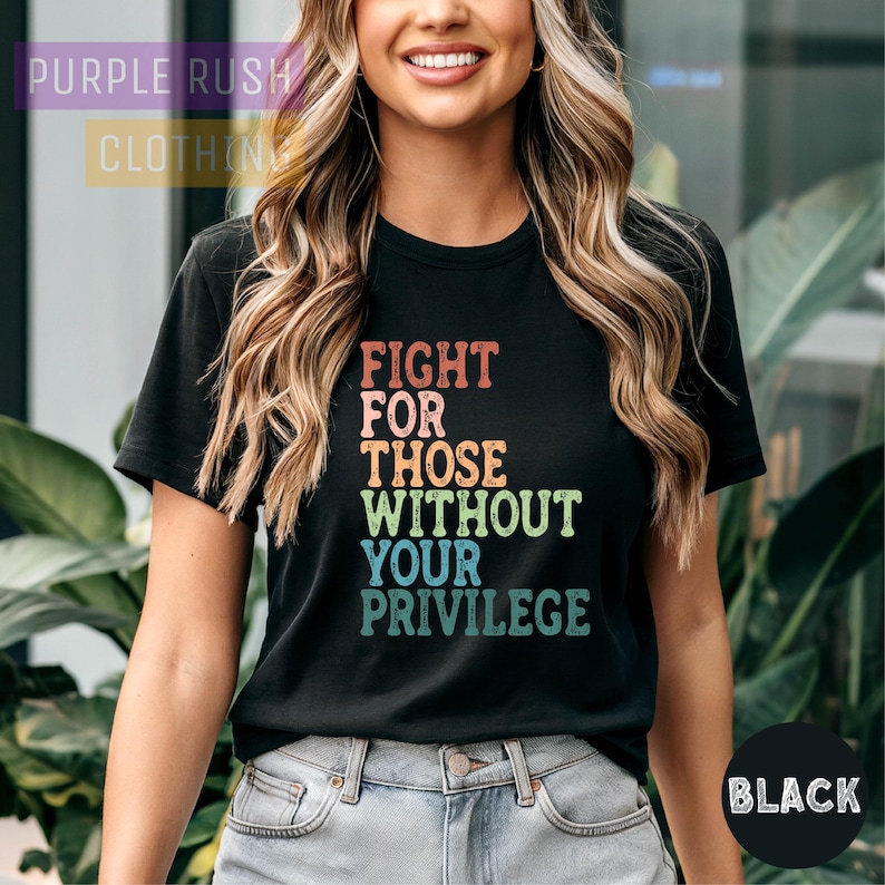 a woman wearing a black t - shirt with the words fight for those without your