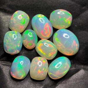 Echtes AAA + Natürlicher Welo Feueropal Mixed Form Bunte Cabochon Lose Edelsteine Großhandelspreis 10 Stück Lot zum Verkauf