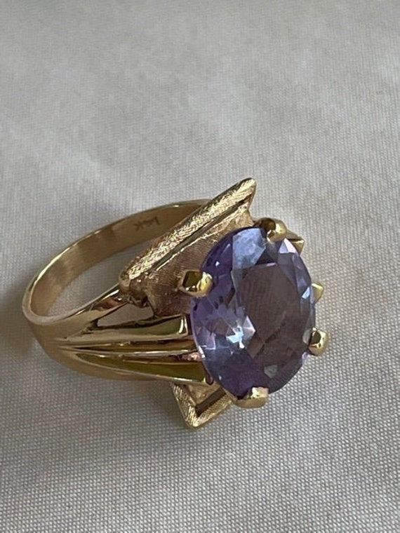 14kt Gold Setting with oval Amethyst