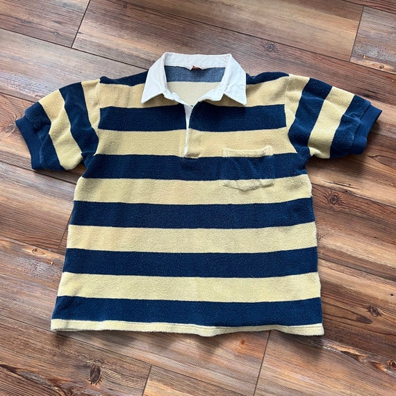 Blue and yellow striped polo shirt hotsell