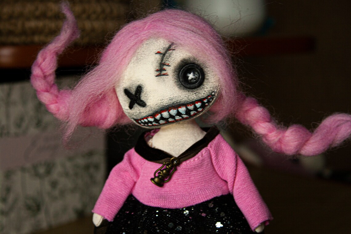 witch with voodoo doll