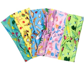 May include: Six colorful headbands with different Disney princess-themed patterns. The headbands are made of a soft, stretchy fabric and feature a variety of characters and symbols, including Cinderella's glass slipper, Belle's rose, and Ariel's seashell.