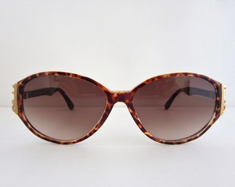 Norma Kamali Can I Tortoise Sunglasses Sofia Coppola Shares Her Summer Essentials main image 4