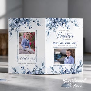 May include: A folded baptism program featuring dark blue watercolor floral accents, two photographs of a child in a light blue suit, and text reading Welcome To The Baptism Of Our Son, MICHAEL WILLIAMS, Sunday April 15th, 202X, and I AM A Child of God.