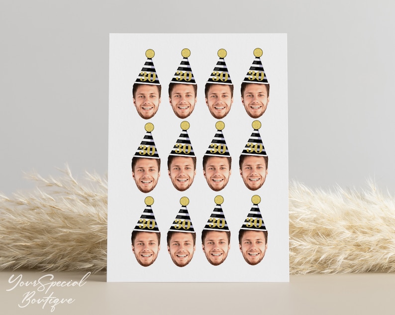 May include: A sheet of 12 black and white party hat stickers with gold numbers. Each sticker features a face wearing a party hat with the number 30 on it.