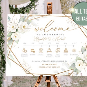 May include: A white wedding welcome sign with gold geometric frames and floral accents. The sign includes the text "Welcome to our wedding Elizabeth & Michael" and a wedding day timeline.