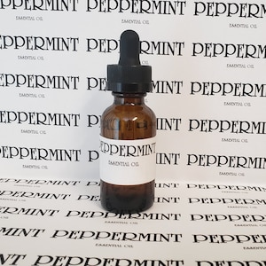 May include: A brown glass bottle of peppermint essential oil with a black dropper. The label reads "Peppermint Essential Oil". The background features a repeating pattern of the words "Peppermint Essential Oil".