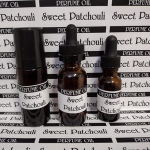 May include: A set of three ceramic mugs with a speckled, matte finish. The mugs are in shades of cream, light gray, and dark gray. Each mug has a simple, minimalist design and a rounded handle.