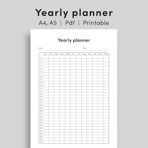 May include: A black and white printable yearly planner with a grid layout. The planner has a section for goals, year, and each month of the year. The planner is designed for use with a pen or pencil.