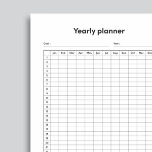 May include: A black and white yearly planner with a grid layout. The planner has spaces for each month of the year, from January to December. The planner also has a space for a goal and a year.