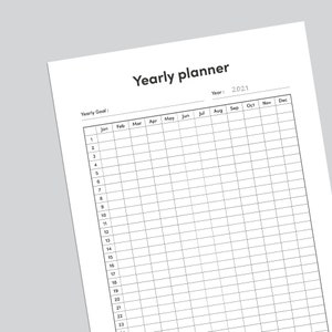 May include: A black and white yearly planner with a grid layout for each month of the year. The planner is labeled "Yearly planner" and includes the year "2021".