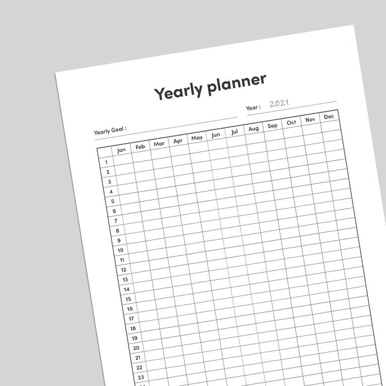 May include: A black and white yearly planner with a grid layout for each month of the year. The planner is labeled "Yearly planner" and includes the year "2021".