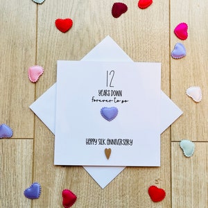 Tarjeta de aniversario de seda de 12 años