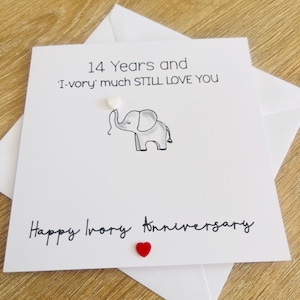 Tarjeta de aniversario de bodas con elefante de marfil