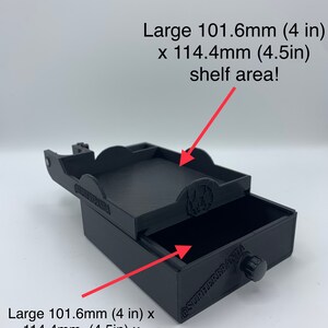 May include: Black plastic storage box with a drawer. The box measures 4 inches by 4.5 inches and the drawer is 1.25 inches deep. The box has a shelf area that measures 4 inches by 4.5 inches.