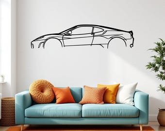 May include: A black and white line drawing of a sports car on a white wall above a light blue sofa with orange and brown throw pillows.