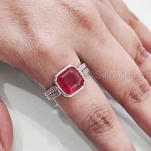 May include: A set of three ceramic mugs with a speckled, matte finish. The mugs are in shades of cream, light gray, and dark gray. Each mug has a simple, minimalist design, perfect for coffee or tea.