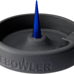 May include: A black ashtray with a blue spike in the center. The ashtray has the word "DEBOWLER" embossed on the bottom.